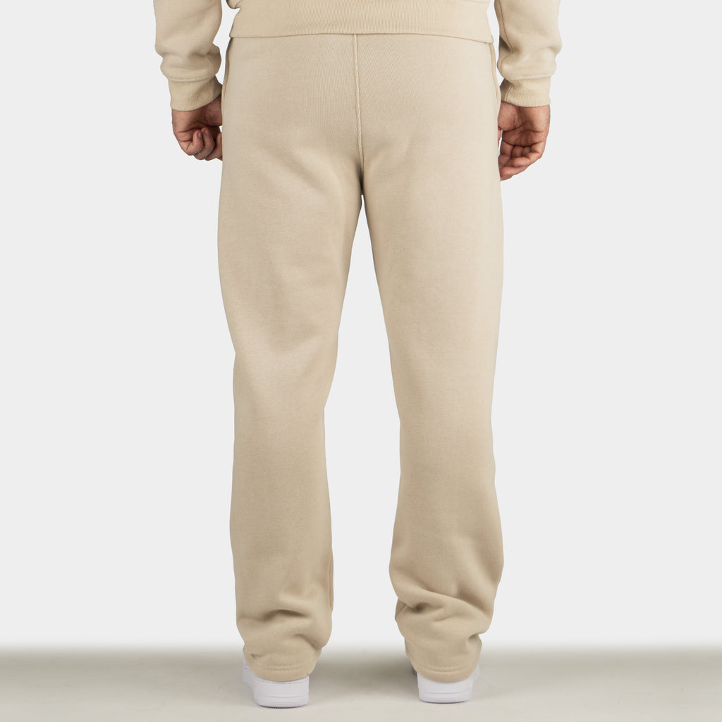 Beige men´s Baze Dessert flow pants - model back view