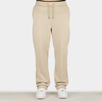 Beige men´s Baze Dessert flow pants - model front view
