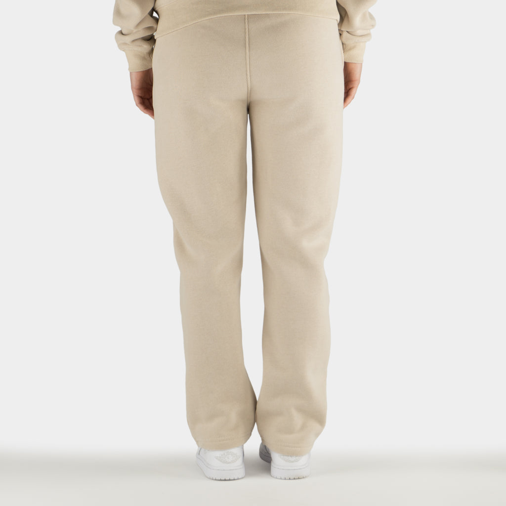 Beige women´s Baze Dessert flow pants - model back view