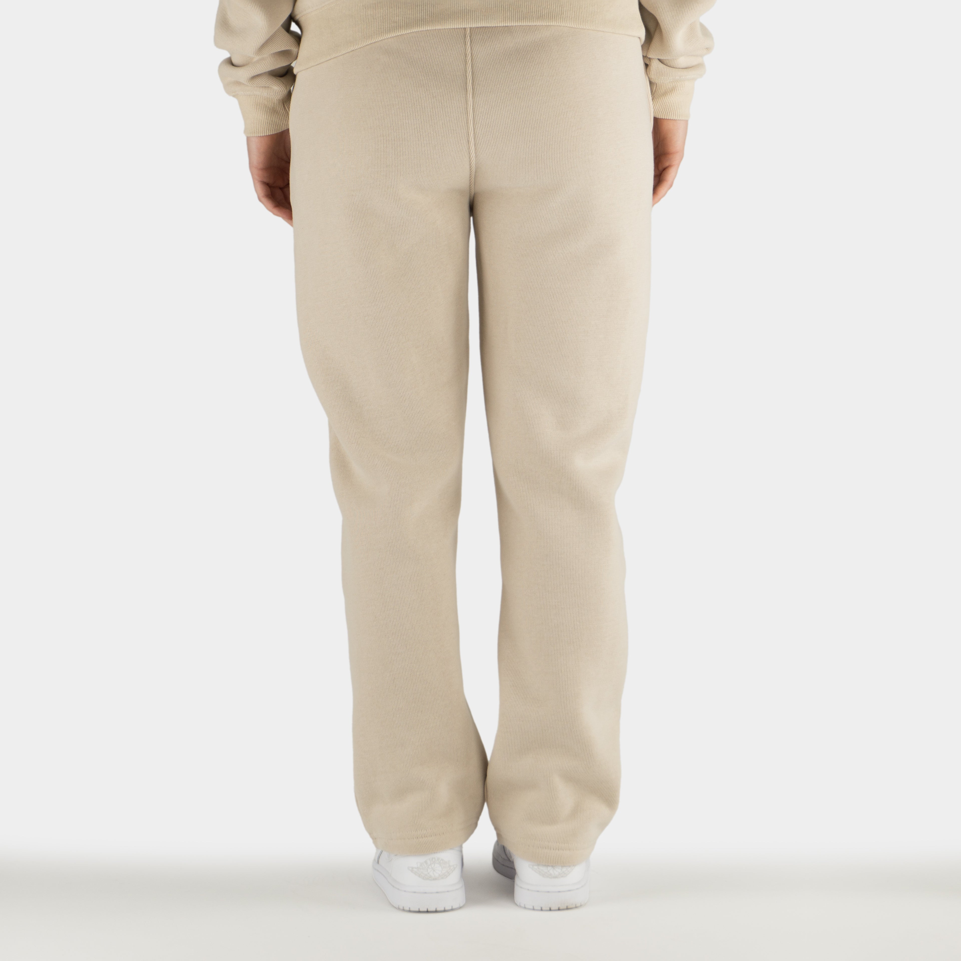 Beige women´s Baze Dessert flow pants - model back view