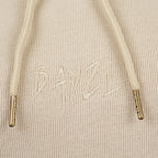 Beige women’s Baze Dessert hoodie – front logo view