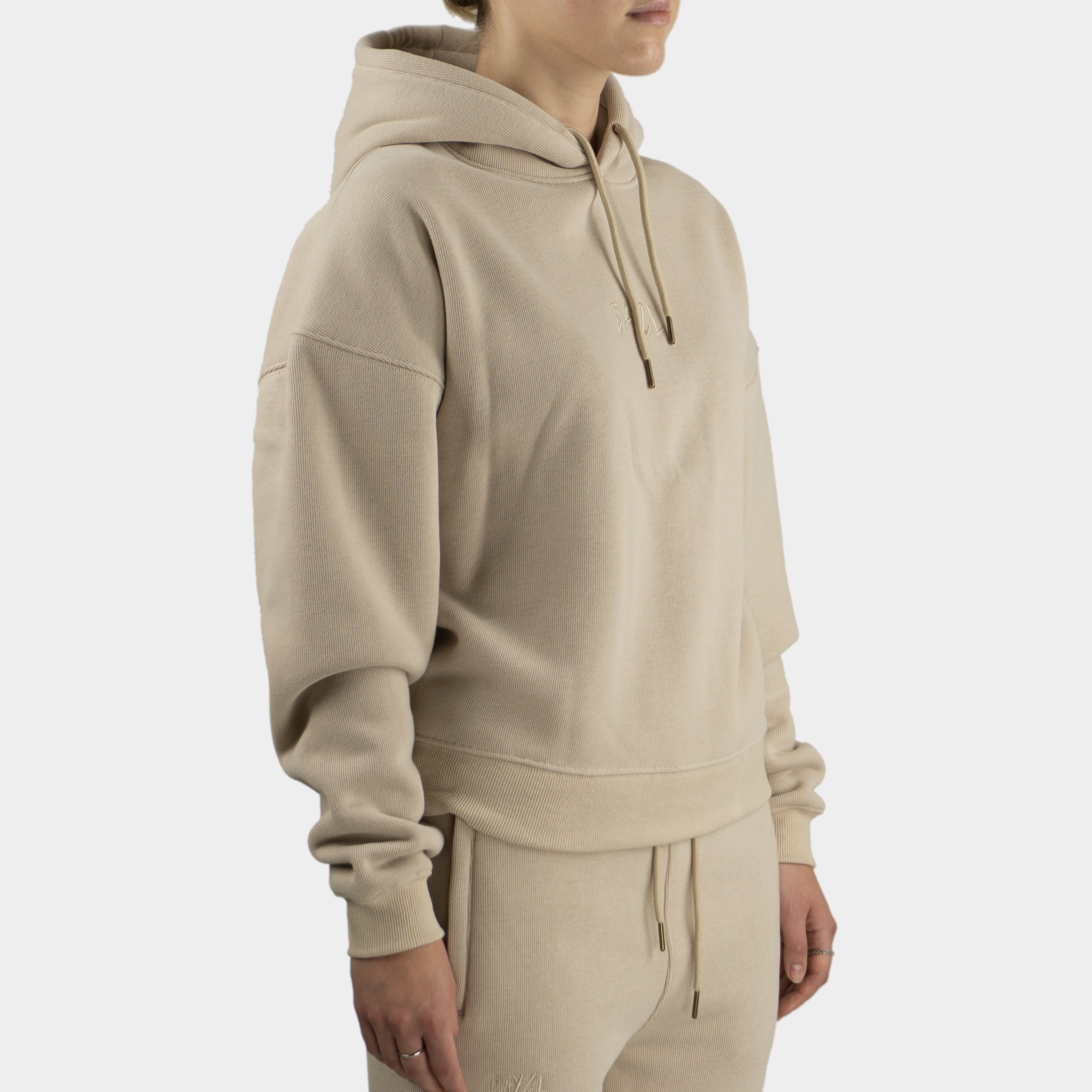 Beige women´s Baze Dessert hoodie - model side view