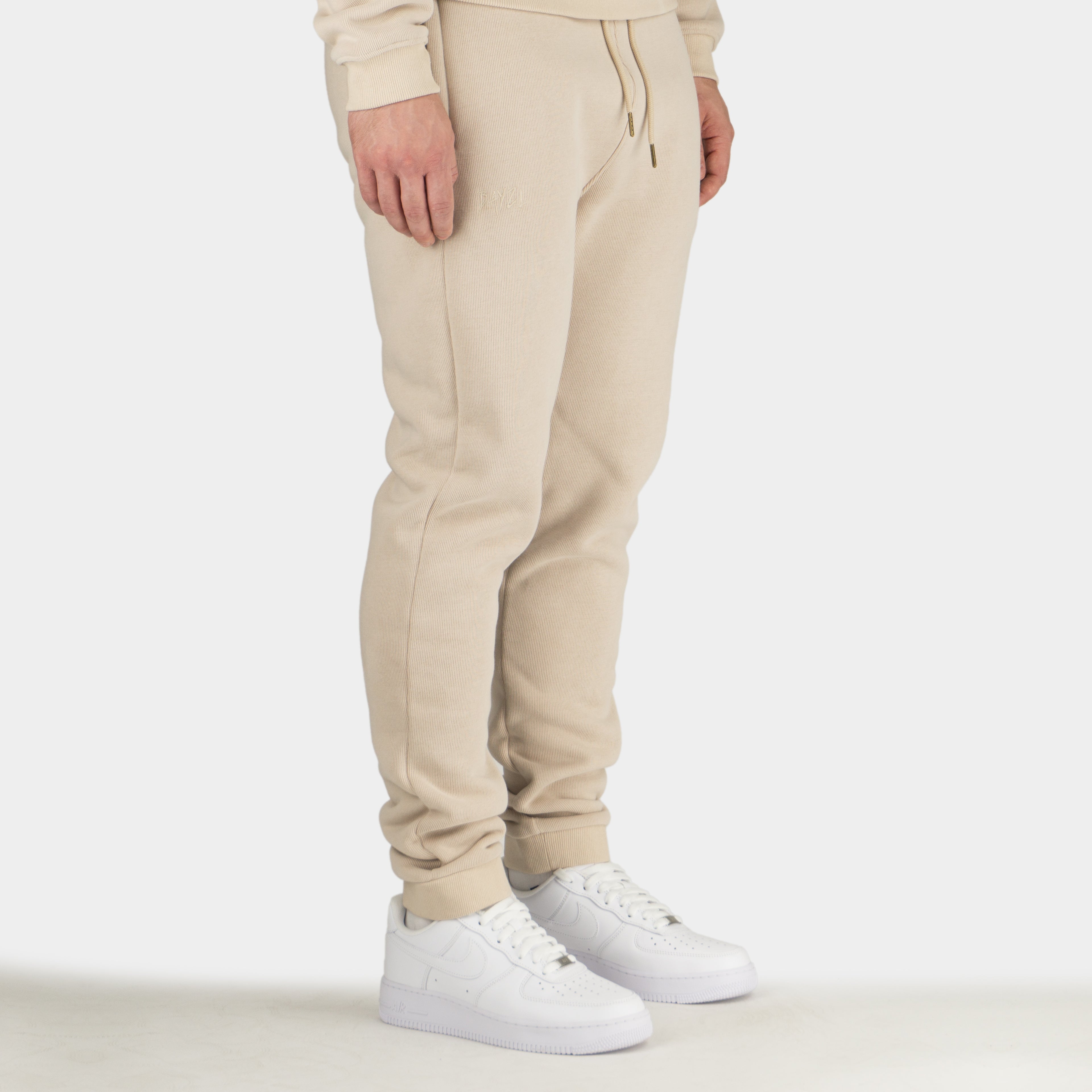 Beige men´s Baze Dessert lock pants - model side view