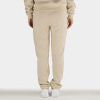 Beige women´s Baze Dessert lock pants - model back view