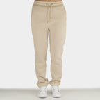 Beige women´s Baze Dessert lock pants - model front view