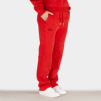 Red women´s Baze Ember flow pants - model side view