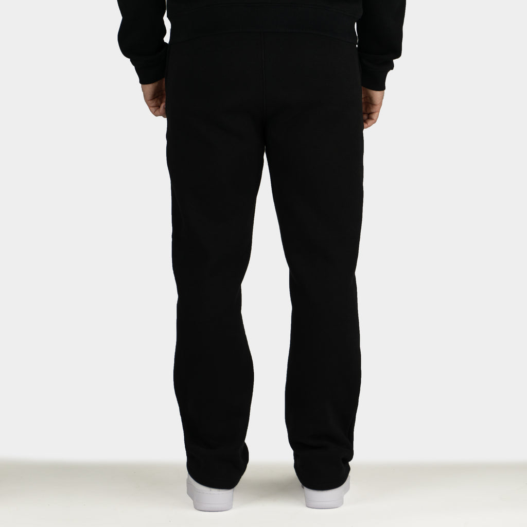 Black men´s Baze Midnight flow pants - model back view