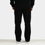 Black men´s Baze Midnight flow pants - model back view