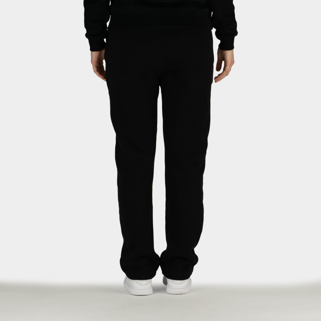 Black women´s Baze Midnight flow pants - model back view