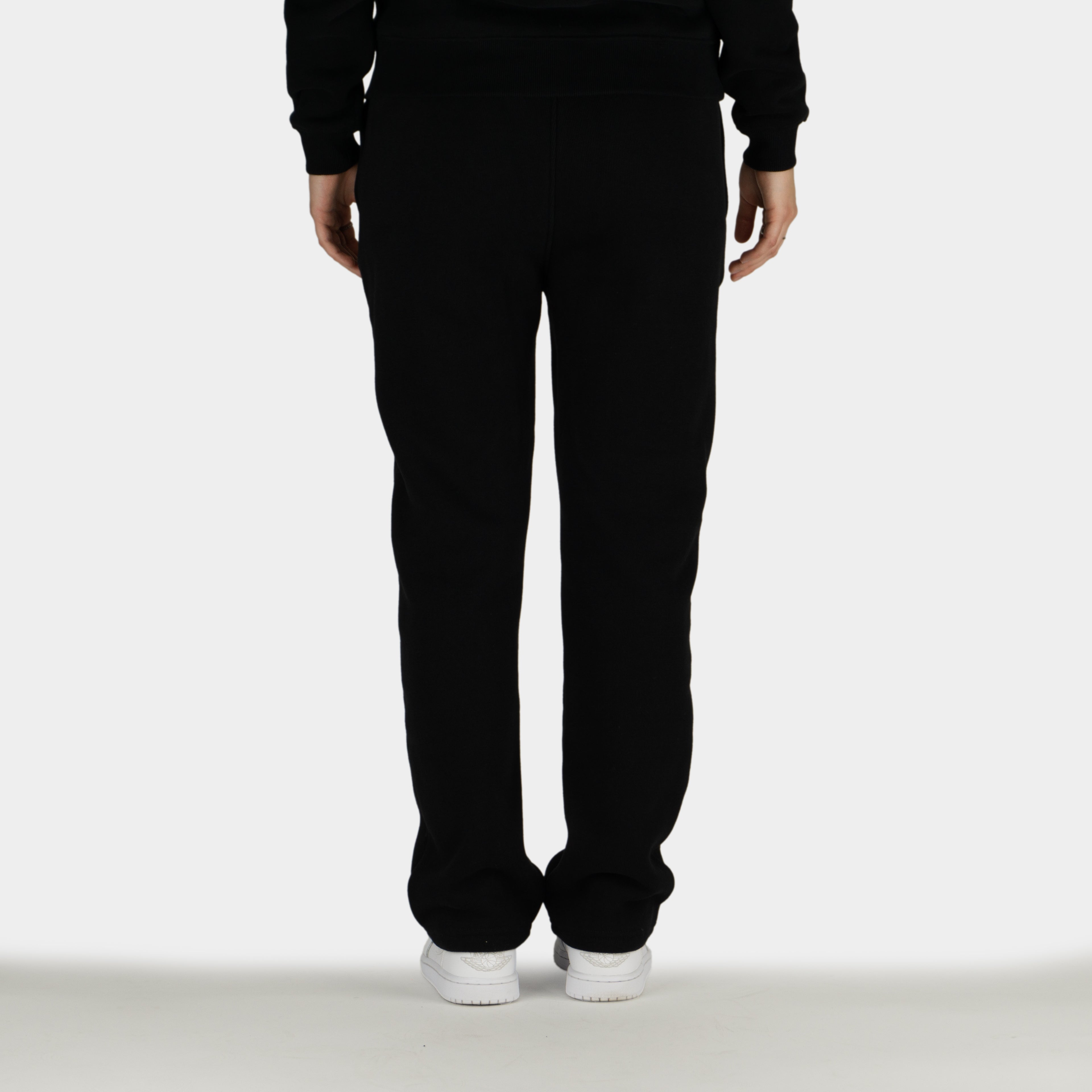 Black women´s Baze Midnight flow pants - model back view