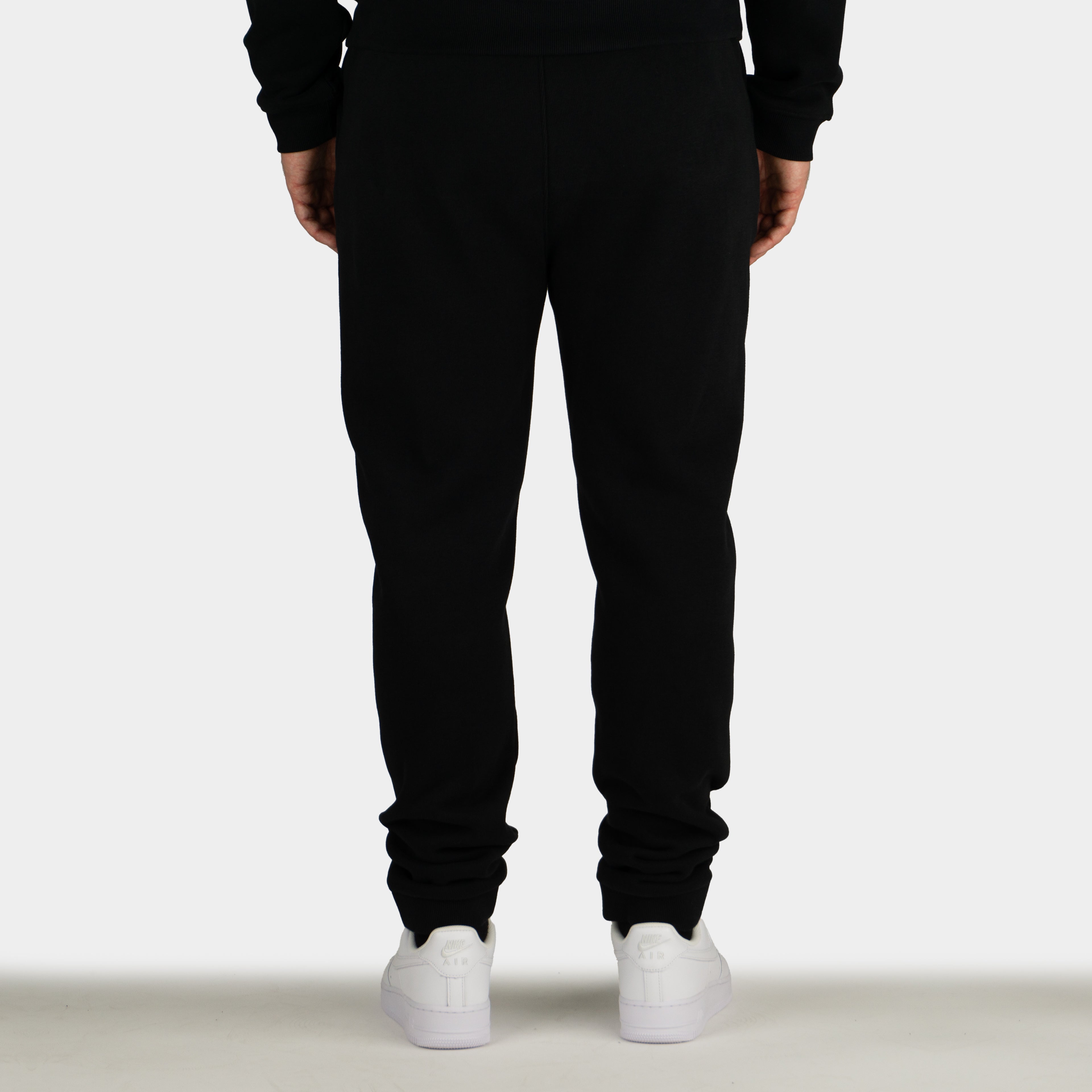 Black men´s Baze Midnight lock pants - model back view