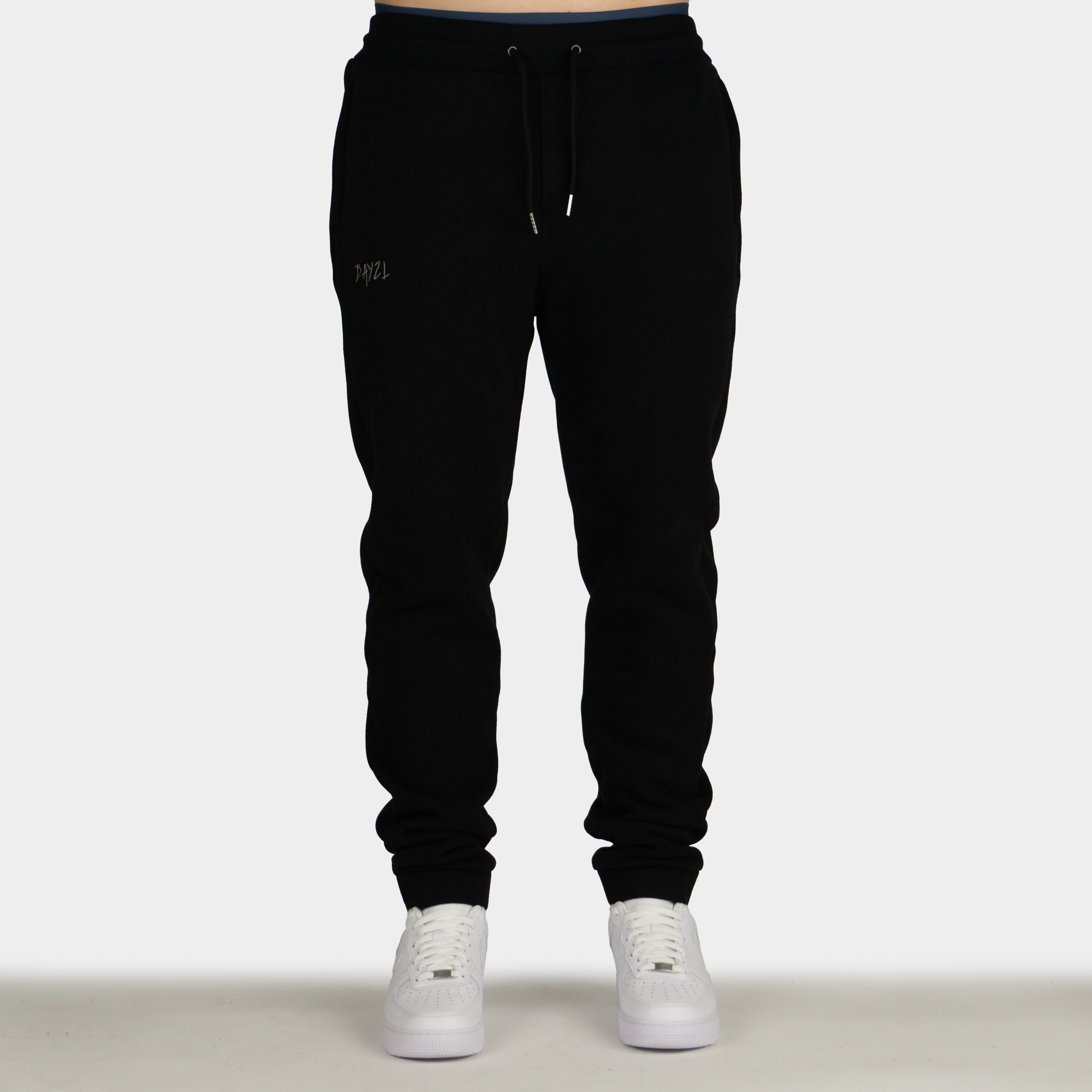 Black men´s Baze Midnight lock pants - model front view