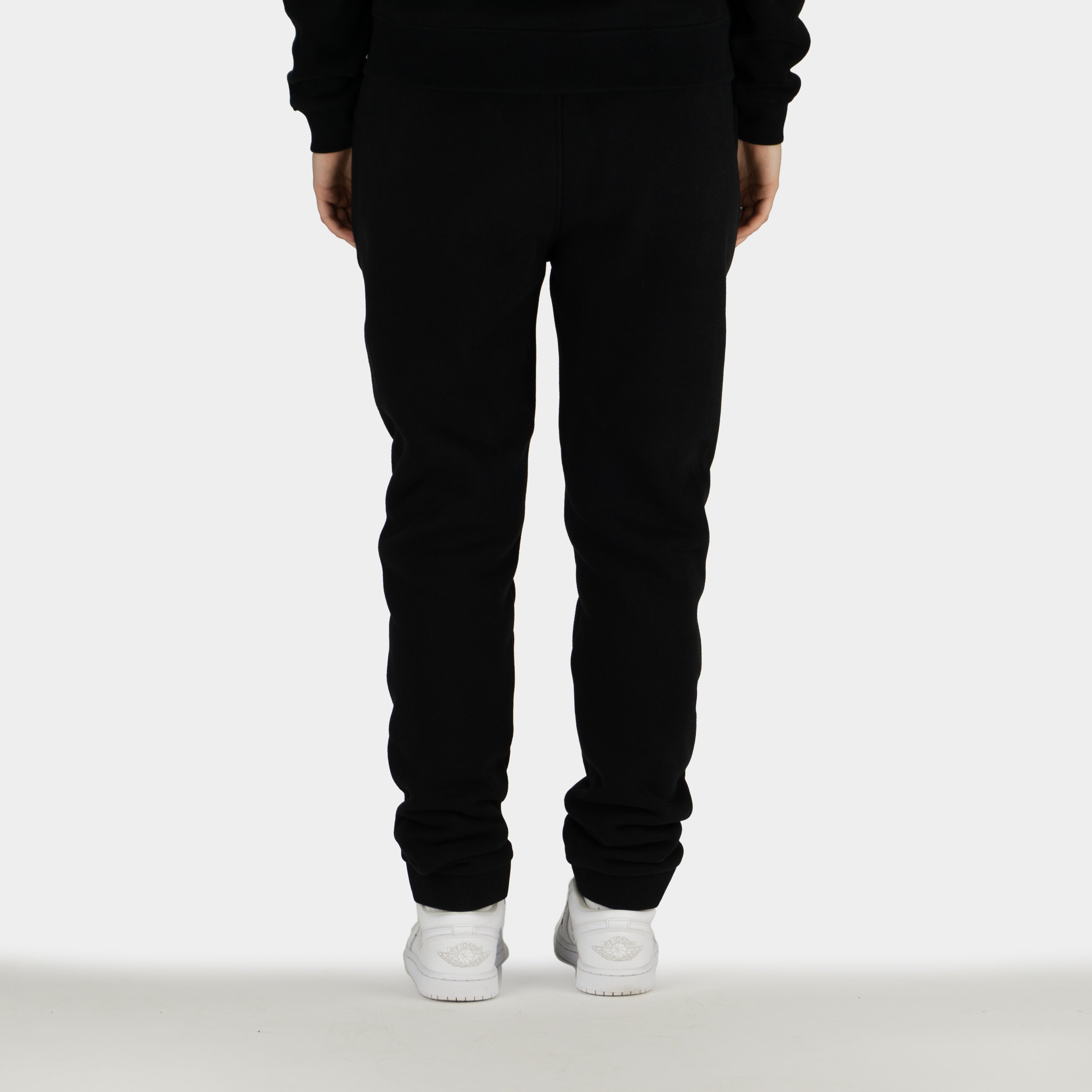 Black women´s Baze Midnight lock pants - model back view