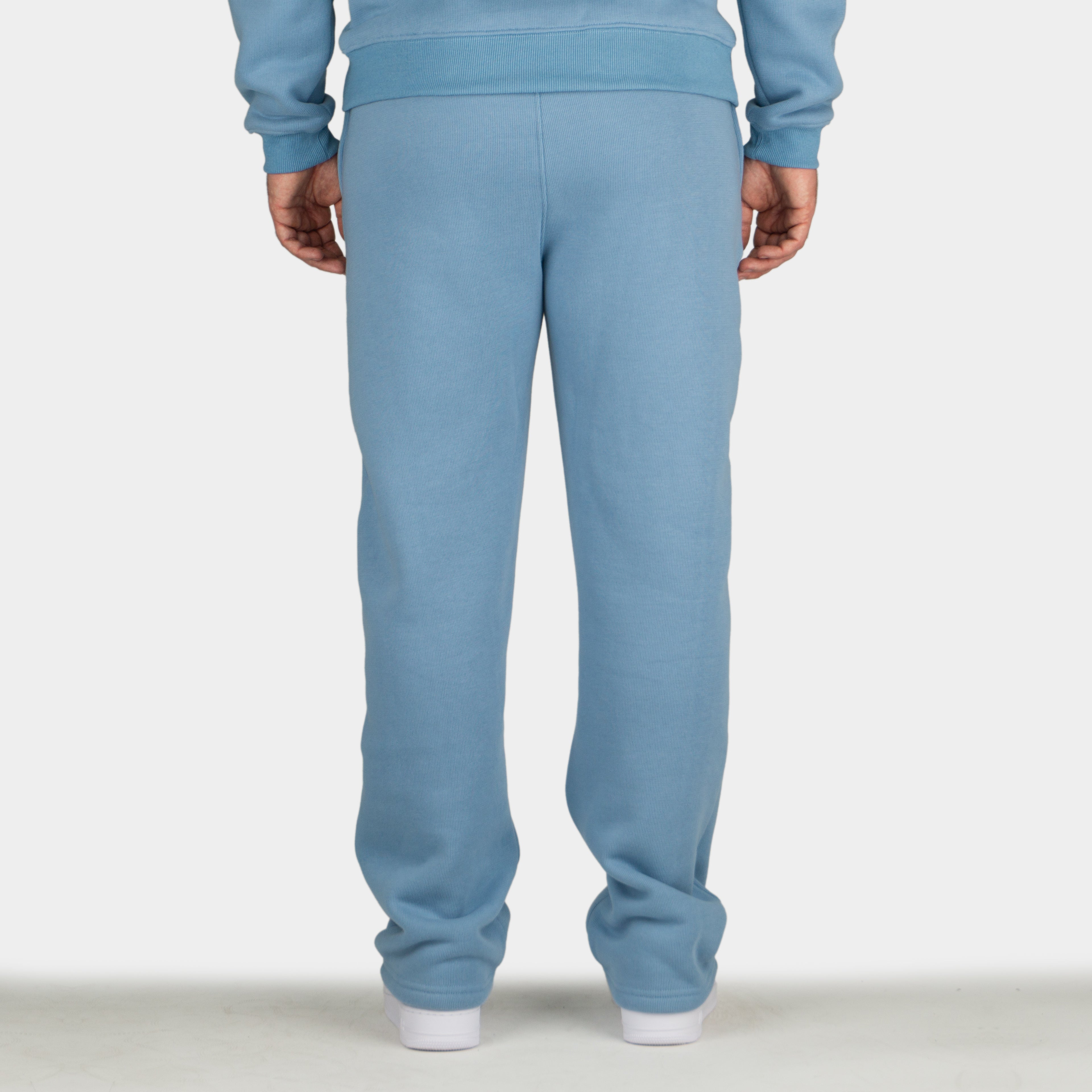 Blue men´s Baze Skyline flow pants - model back view