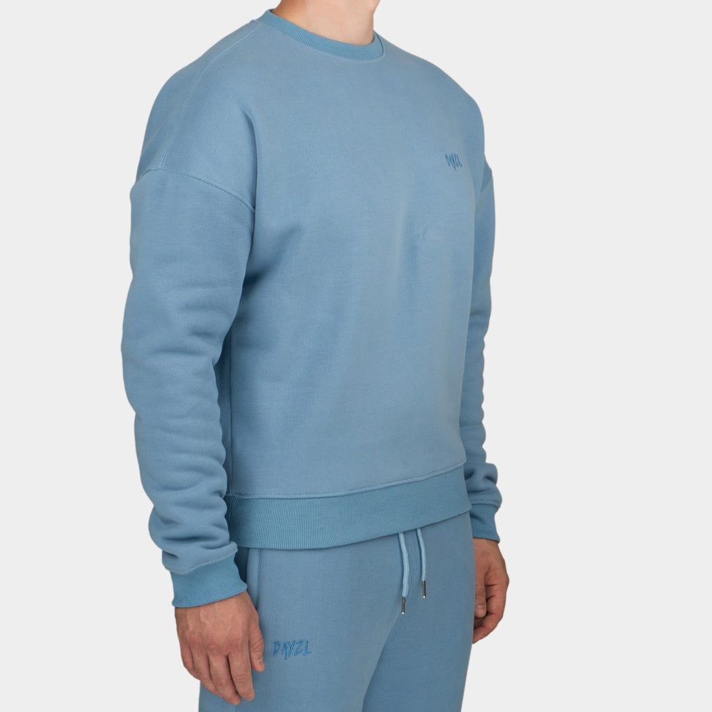 Blue men´s Baze Skyline sweater - model front view